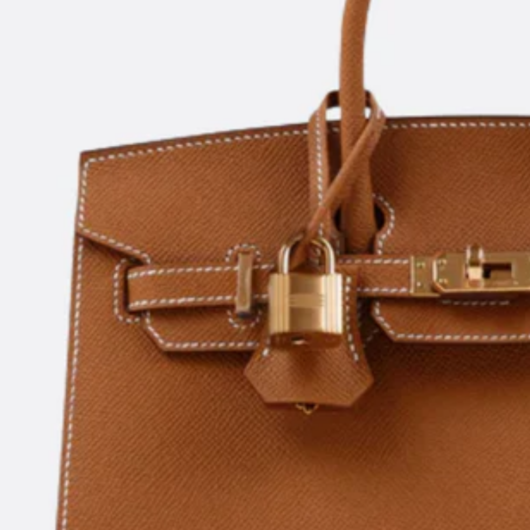 Tasche 25 Brk HSS Cr / GryTr aus Tg-Leder mit gebürsteten goldfarbenen Beschlägen