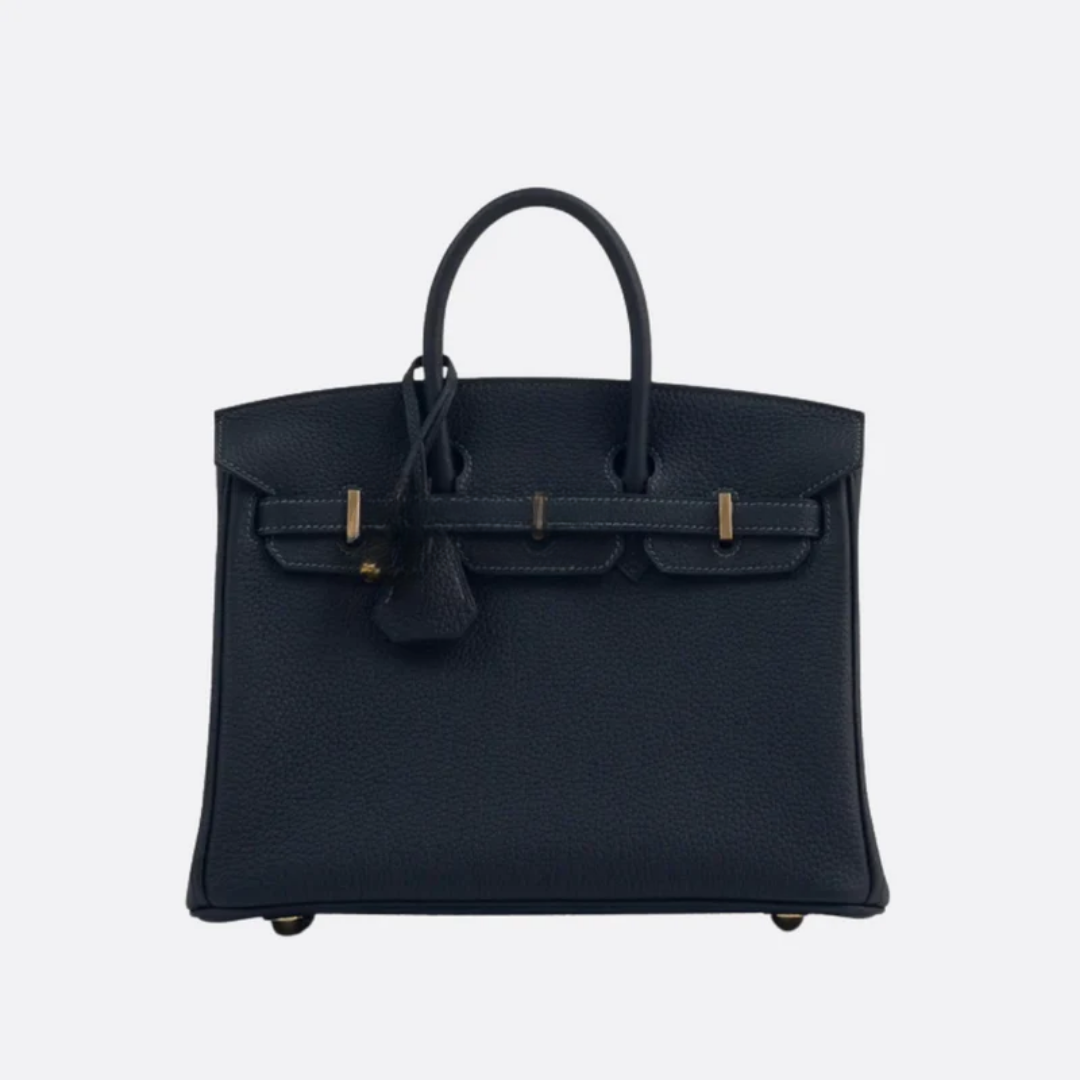 Tasche 25 Brk HSS Cr / GryTr aus Tg-Leder mit gebürsteten goldfarbenen Beschlägen