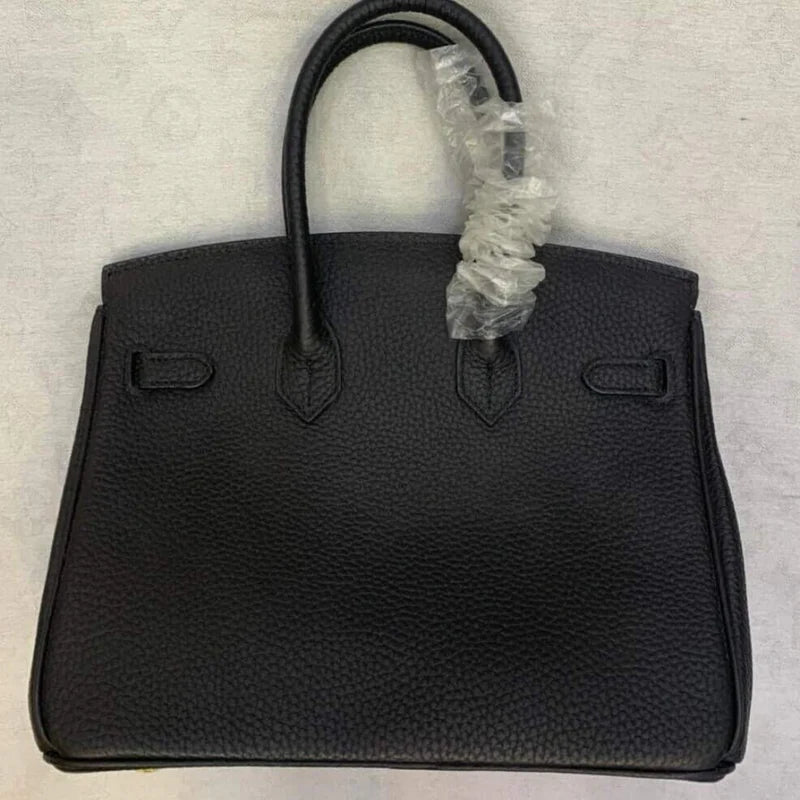 Tasche 25 Brk HSS Cr / GryTr aus Tg-Leder mit gebürsteten goldfarbenen Beschlägen